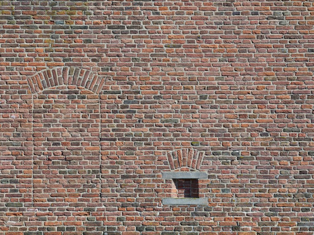 Ex finestra nel muro di mattoni
