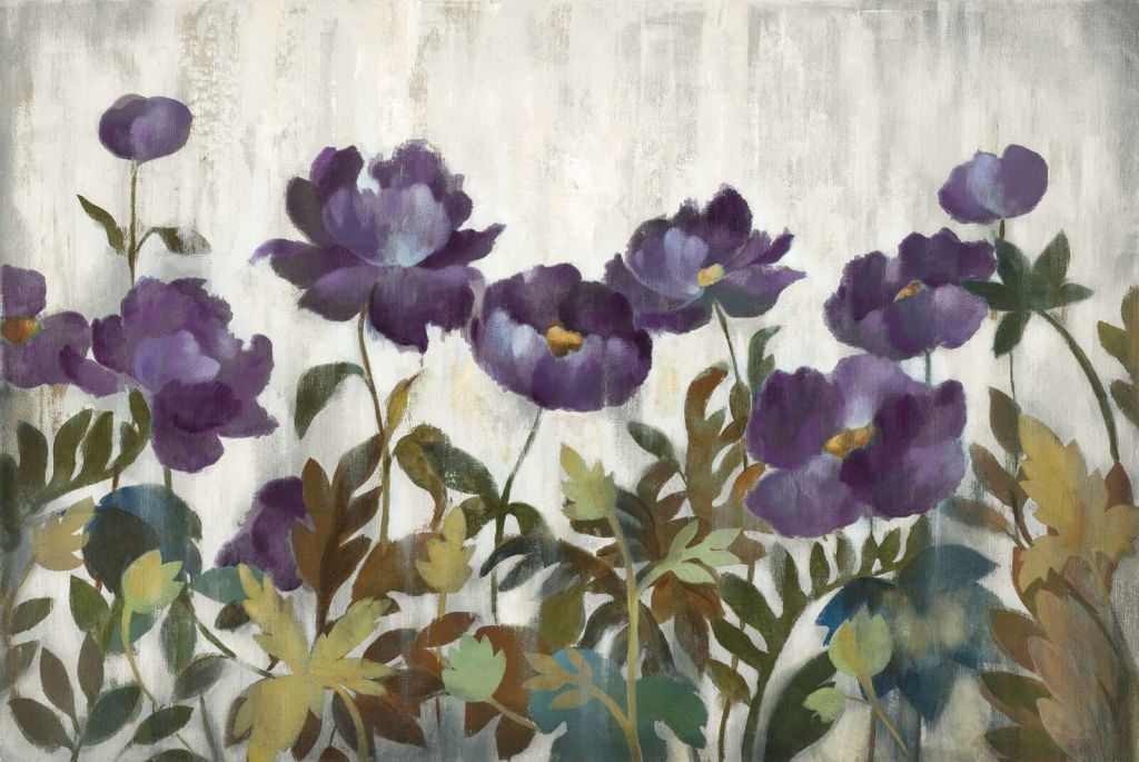 Fioritura viola profonda all'ombra delle foglie