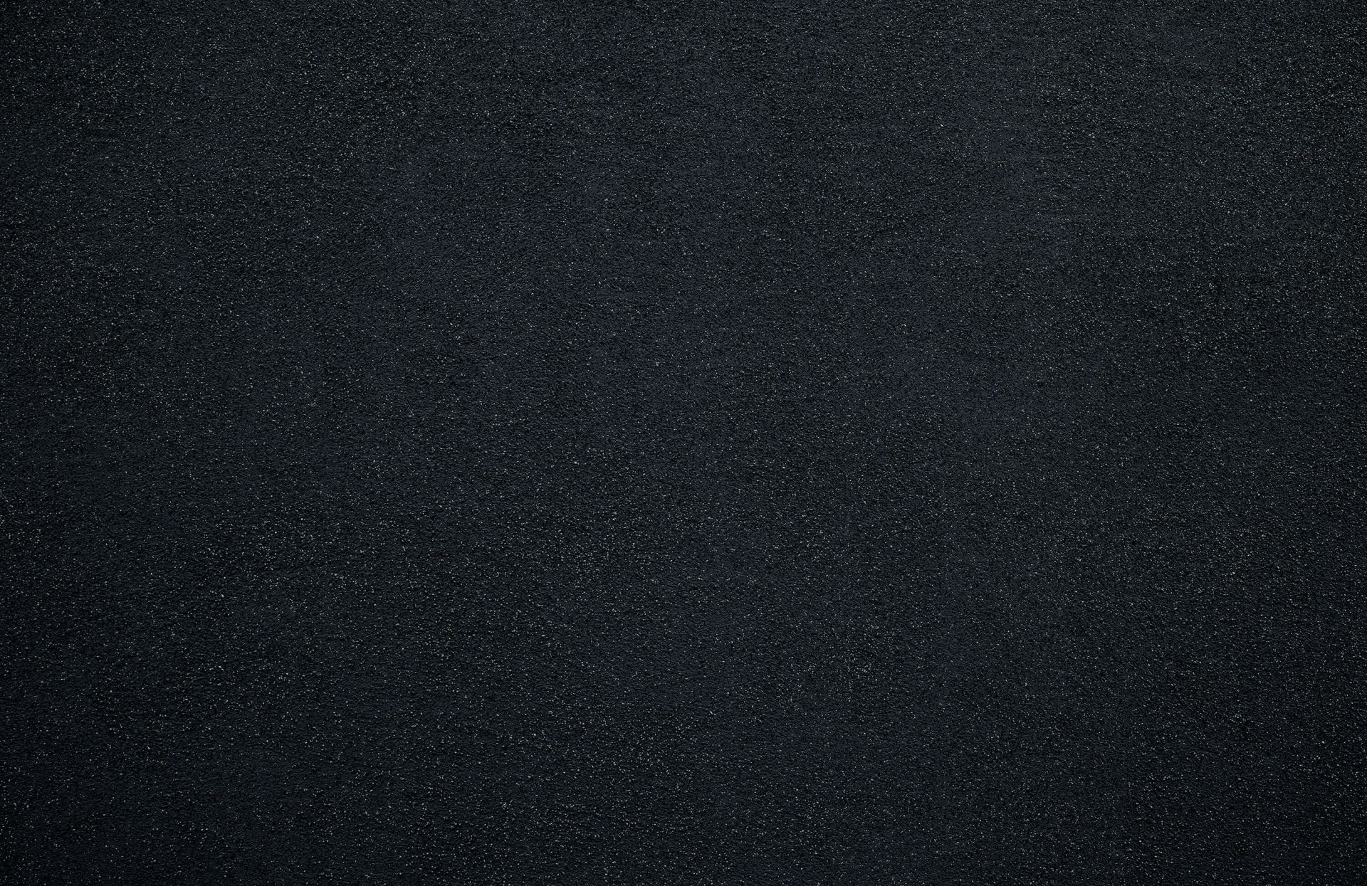 Muro scuro con pietre fini