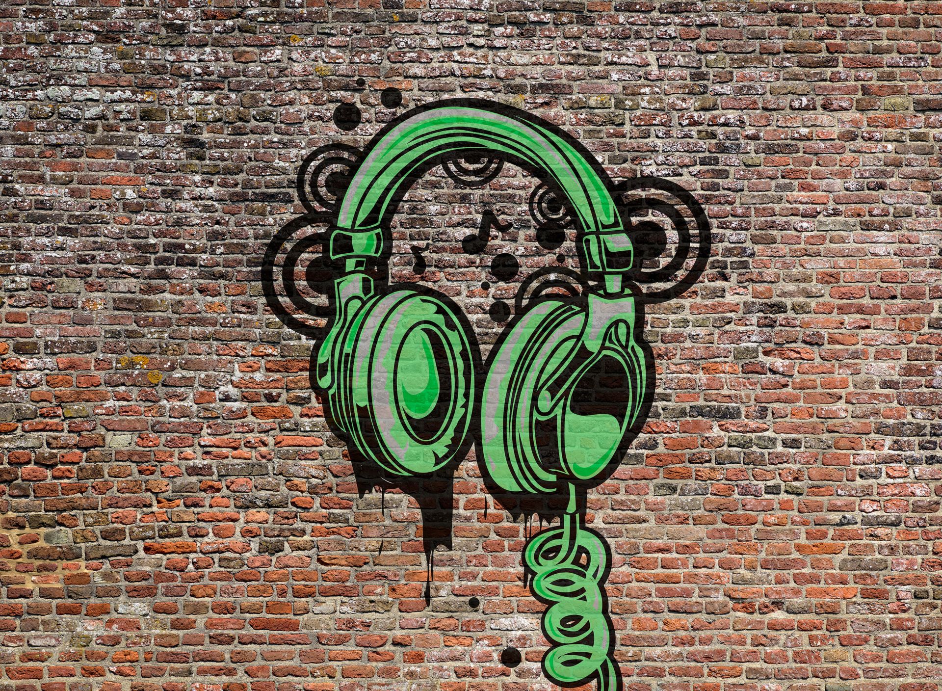 Graffiti su un vecchio muro di mattoni