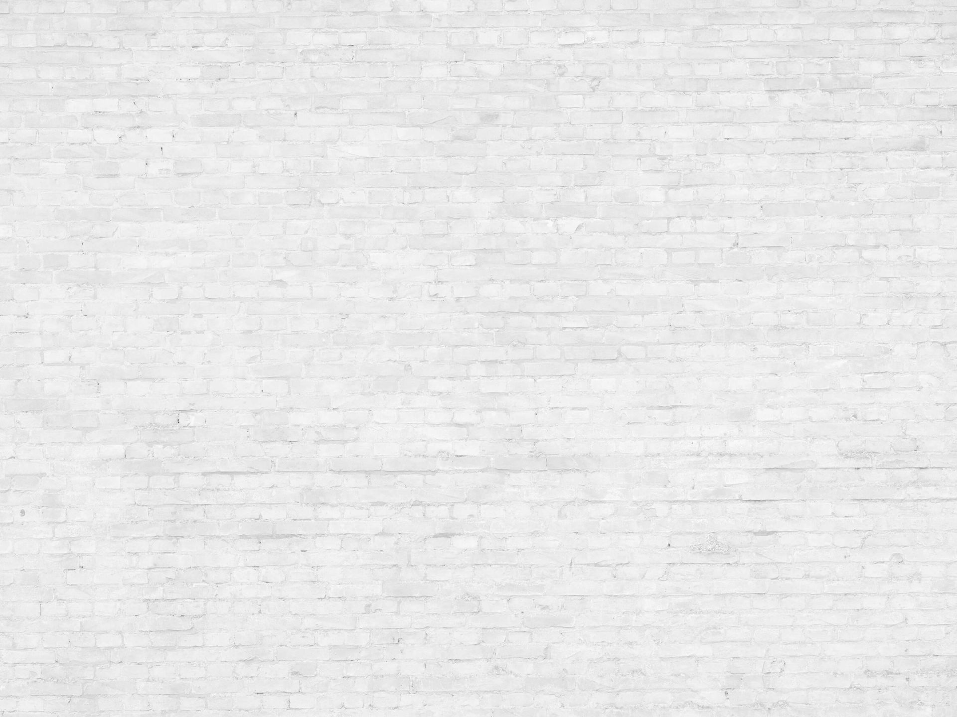 Vecchio muro di mattoni bianchi