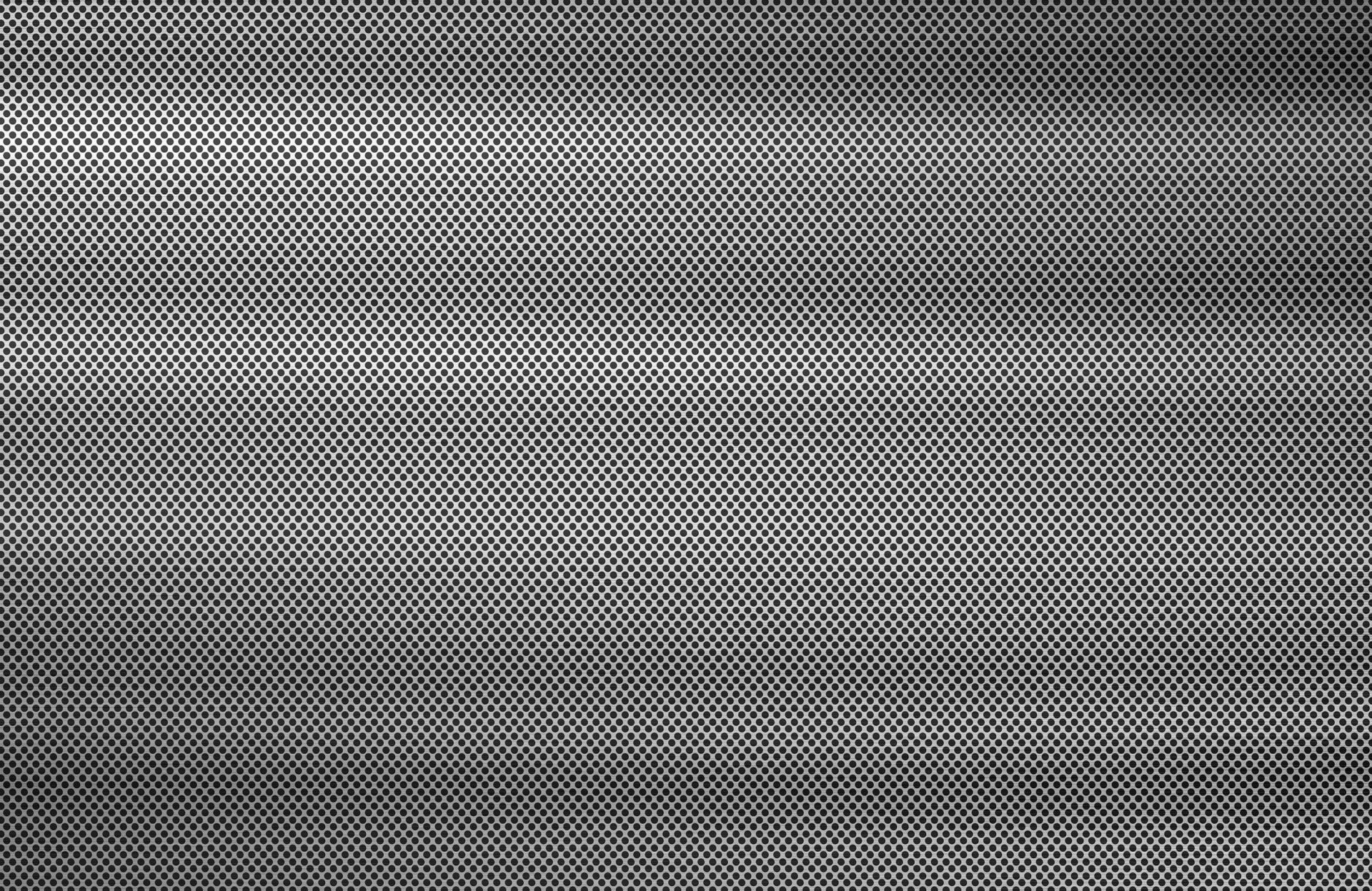 Superficie metallica perforata